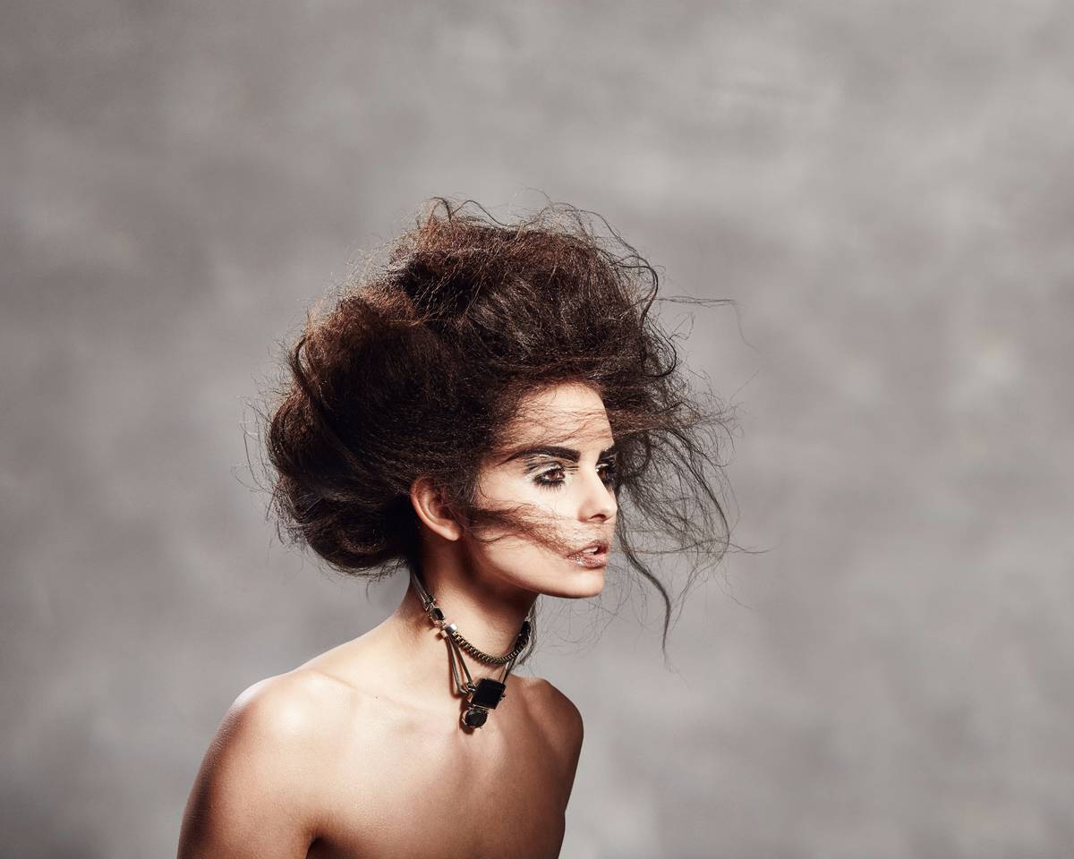 professional makeup trends 2024 backstage artist blending foundation for camera-ready finish